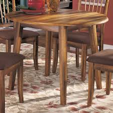 Bring your family together for dinner over one of our handcrafted dinette sets! Ashley Furniture Berringer 1184402 Hickory Stained Hardwood Round Drop Leaf Table Dunk Bright Furniture Kitchen Tables