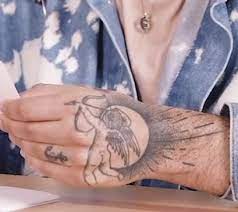 Angel Cupid Hand Tattoo Hand Tattoos Angel Hand Tattoo Tattoos