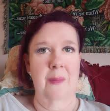 What do you think of Chris with piercings vs without?