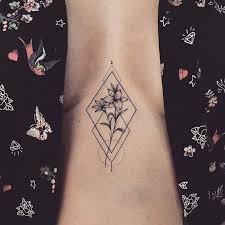 43 Pretty Lily Tattoo Ideas For Women Tattoos Lily Tattoo Sternum Tattoo