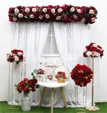 Have flower arrangements in the initials of you and your new spouse created to hang at your wedding. 35 45 50cm Diy Burgundy Wine Red Artificial Flower Ball Table Centerpieces Wedding Decor Party Flower Row Arrangement Christmas Artificial Dried Flowers Aliexpress