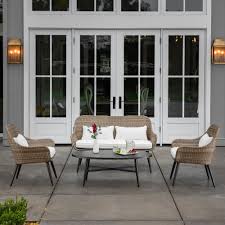Royal Garden Amberly Brown 4 Piece Wicker Outdoor Conversation Set With White Cushions Ambsst406 The Home Depot Outdoor Furniture Sets Patio Furniture Sets Small Outdoor Spaces
