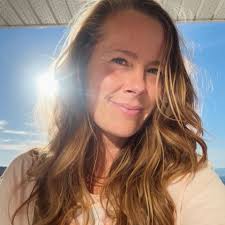 Who can recommend a wedding photographer for July 14th?