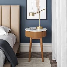 I made a round table cloth for my table, but this is not the only way to cover a round table with fabric. Round Bedside Table