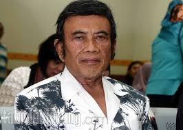 Rhoma Irama dan Ricca Rachim Saat Nyoblos