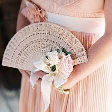 Wedding fans instead of bouquets. Boho Pins Top 10 Pins Of The Week From Boho Alternative Bouquets Boho Wedding Blog Bridesmaid Bouquet Alternatives Alternative Bouquet Unique Bridal Bouquets
