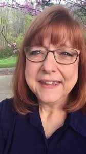 Jesus said, “Mary.”, Turning...