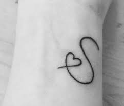 Other meaning of heart tattoos can be compassion, true love or courage, and can therefore be used to express love, grief, loss or memorial to the deceased. S Letter Tattoo Designs 20 Trending Tattoos In 2021