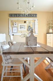 Lavish dining room has a lovely yellow aura [photography: Dining Room Gallery Wall Sarah Joy Farmhouse Dining Rooms Decor Farmhouse Dining Room Table Farmhouse Dining Room