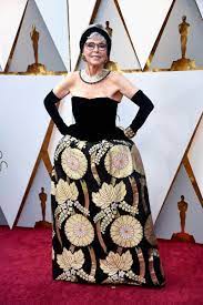 Rita moreno is one of the very few performers to win an oscar, an emmy, a tony and a grammy, thus becoming an egot. Great Outfits In Fashion History Rita Moreno Re Wearing Her 1962 Oscars Dress In 2018 Fashionista