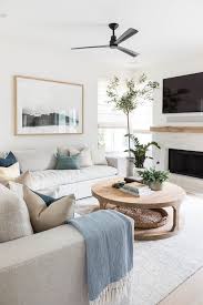 Take advantage of light and spacious rooms with a long, statement fireplace in paneled fireplaces with ceramic tiling will add a contemporary country look to any living room, without dating. 6 Coastal Fireplace Ideas That We Wouldn T Mind Snuggling Up To Hunker Bright Living Room Dining Room Makeover Coastal Living Room