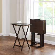 It includes four tray tables that can be used for serving food or placed in a corner to hold plants or knickknacks, making a fashionable addition to your room. Mainstays Walnut 5 Piece Folding Tv Tray Table Set 4 Trays 1 Stand 19x15x26 Inch Walmart Com Walmart Com