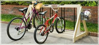 I Will Make This However I Will Put A Metal Roof Of Some Sort Over It So The Bikes Will Be Protected Outside Bike Rack Diy Bike Rack Lowes Creative