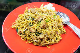 Plunge the noodles into cold water to stop the cooking, drain in a colander set in the sink, and drizzle the noodles with 1 tablespoon of vegetable oil. Indonesian Stir Fried Noodles Bakmi Goreng With Chicken Or Seafood A Street Food Noodle Classic From Java Island Stock Photo Picture And Royalty Free Image Image 117626463