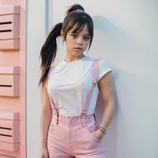 NSFW, jenna ortega, long ponytail, pink overalls, studs, white shirt -  SeaArt AI