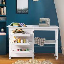 5 tier storage rack $ 49 99. Buy Folding Wood Sewing Table Sewing Machine Craft Cart Cabinets Clearance With Storage Shelves Bins And Lockable Casters For Home White Online In Turkey B08xqmkcy9