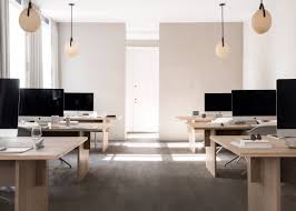 12 Of The Best Minimalist Office Interiors Where There S Space To Think The built in shelving units takes off the focus of the desk area and creates a very sophisticated minimalist feel.