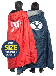 Blankets that can be used as a traditional blanket, but also have a hole in them that you can pop your head through. The Fanwrap Poncho Sports Blanket