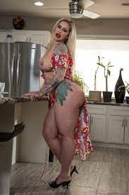 Chubby stepmom Ryan Conner doing a hot striptease & flaunting her very big  ass - PornPics.com