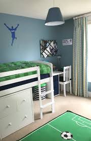 Boy S Blue And Green Football Room Blue Boys Football Green Room In 2020 Boys Bedroom Themes Kids Room Bed Football Rooms