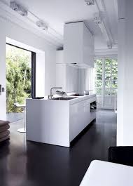 Hotel Particulier A Paris Une Maison De Famille Aux Allures De Loft Cuisine Moderne Blanche Decoration Salon Cuisine Et Cuisine Minimaliste