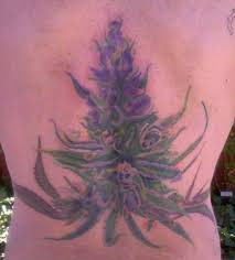 Cannabis leaf tattoo design on chest tattoos for guys. Weed Tattoos