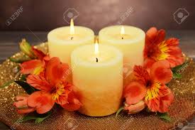 Check spelling or type a new query. Beautiful Candles With Flowers On Table On Brown Background Stock Photo Picture And Royalty Free Image Image 28645340