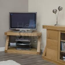 The top and the door (including the decorative arch on the bottom of the door) are oak. Homestyle Z Designer Solid Oak Corner Tv Unit From The Bed Station