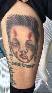 Introduction to the question rihanna got a tattoo across her fingers while wearing a piece of clothing with the face of what rock star?.hint :british step 2 : My Friends Rihanna Tattoo Trashy