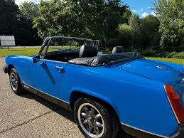 Image result for Tahiti Blue 1977 MG