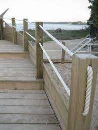 I'm looking to make a deck railing similar to this idea. Rope Deck Porch Railings Inspirational 12 Breathtaking Rope Deck Railing Ideas Rope Fence Backyard Fences Building A Deck