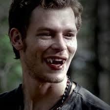 Who wins in a fight between Klaus and Deanmon?