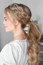 A messenger with a four stands braid in the stap and next to the zip. 4 Strand Braid Ponytail Missy Sue