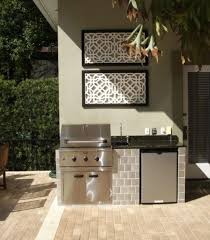 Just because your outdoor space is small, it doesn't mean it can't be magical. When Designing An Outdoor Space Personalization Is Key This Is Especially True For O Small Outdoor Kitchens Outdoor Kitchen Appliances Outdoor Kitchen Design