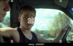 PAPAW LAND, from left: Carson Mitchell, Tyler Winn, 2021. © Gravitas  Ventures /Courtesy Everett Collection Stock Photo