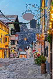Das gebiet ist umgeben von den bayerischen alpen im tal des flusses loisach am fuße des höchsten berges deutschlands — zugspitze. Cozy Narrow Street With Christmas Illumination In Bavarian Town Of Garmisch Partenkirchen Germany Stock Photo Picture And Royalty Free Image Image 49261824