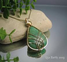 Criss Cross Wire Wrapped Pendant Tutorial Jewelrylessons Com Wire Work Jewelry Wire Jewelry Wire Jewelry Tutorial