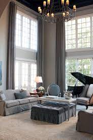 They also aligned the doors and windows at the same height to draw the eye up and create the illusion of more space. Quatrefoil Mirrors My Third Row Of Windows Kelley Nan High Ceiling Living Room Curtains Living Room Modern Window Treatments Living Room