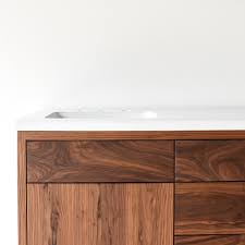 These minimalistic vanities come in a wide variety of colors, from rich black to hot pink. 60 Floating Walnut Vanity What We Make