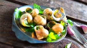 Stick a small fork or thin knife into the shell and detach the flesh from the shell. A Guide To Eating Escargots In France P O Ferries Blog