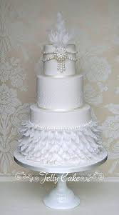 It seems like we've been waiting forever for the great gatsby to come out, and we're so excited opening week is finally here that we've decided to kick it off with this. 1920s Wedding Cake 1920s Wedding Cake Feather Wedding Cake Themed Wedding Cakes