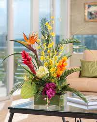 Their one drawback though is that they also have no sense, but you can add ascent with simple perfumes or other aerosols that will. Torch Ginger And Orchidfaux Arrangement Tropical Flower Arrangements Summer Flower Arrangements Tropical Floral Arrangements