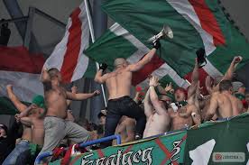Ultras hooligans supporters burn flares during match. Slask Wroclaw Hooligans 2012 Ceefootball