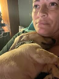 Dachshund owners sharing love and affection for their pets