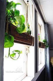 Window boxes are a common way to display flowers or grow vegetables when you've got a lack of garden space. Diy Indoor Hanging Flower Boxes Window Plants Hanging Plants Flower Boxes