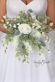See more ideas about wedding bouquets, wedding flowers, bridal bouquet. Brides Bouquet With White Roses And Lots Of Greenery Silver Dollar Eucalyptus Cherry Blos Green Wedding Bouquet Bridal Bouquet Flowers Flower Bouquet Wedding