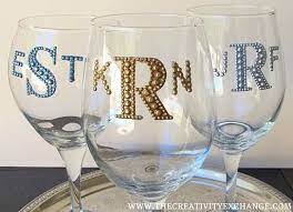 Diy monogrammed glasses.would be neat to do with the handled mugs.for weddings.or use images instead so folks cold just remember glitter wine glasses diy wine glasses decorated wine glasses hand painted wine glasses wine glass images wine glass designs bride wine. Monogram Wine Glasses Permanently With Rhinestone Letters Monogram Wine Glasses Diy Wine Glasses Decorated Wine Glasses
