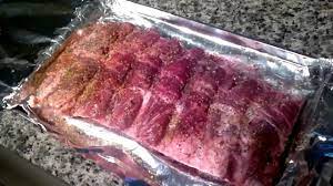 Add the water and apple cider vinegar to the bottom of the baking sheet and cover the baking sheet with tin foil. Bbq Ribs How To Prepare And Cook Beef Ribs In The Oven Youtube