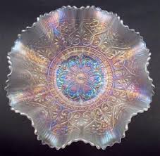 What kind of bowls are at carnival glass? Hearts Flowers By Northwood 9 White Carnival Glass 8 Ruffle Bowl Pastels Carnival Glass Carnival Glassware Carnival Glass Bowls