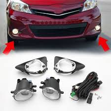 The front end houses sleek narrow upswept headlights, a small grill with a chrome accent and a large trapezium air intake on the front bumper. Areyourshop For Yaris Hatchback 2012 2013 2014 Fog Light With Switch Wiring Cover Kit Front Bumper Fog Lamp Car Parts Car Light Assembly Aliexpress